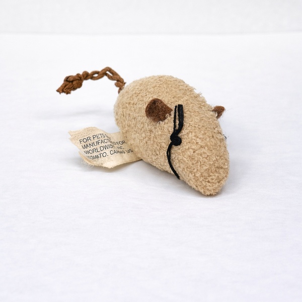 Victim — tan plush mouse with eye mutilation